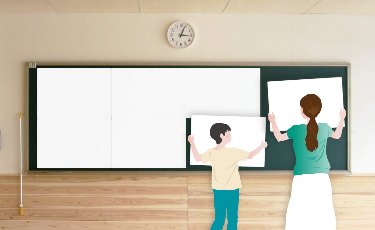 KisePaを貼る先生と子ども